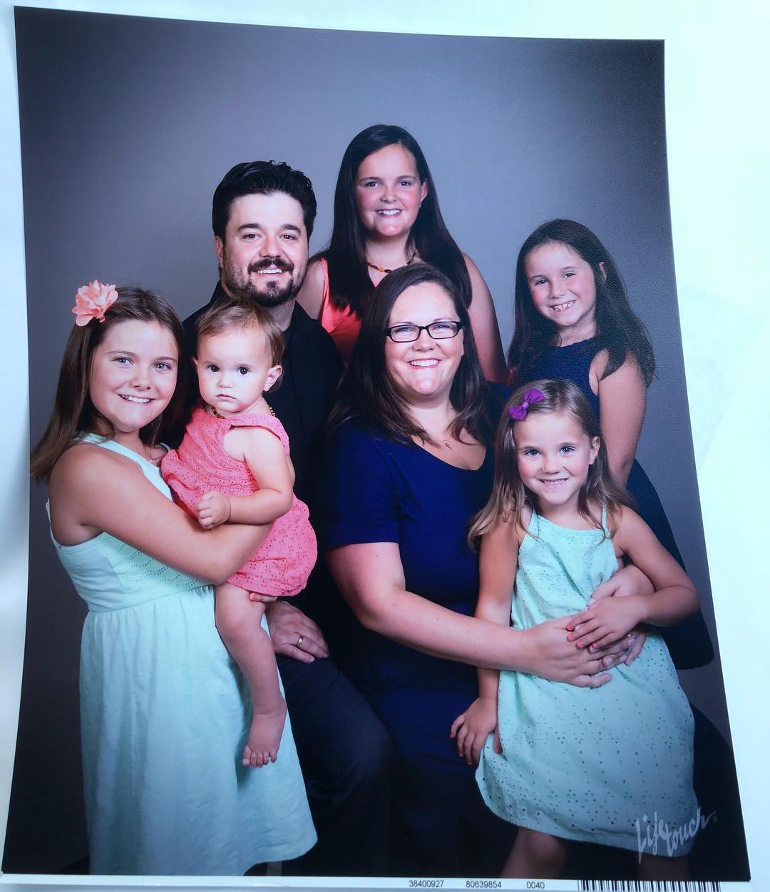 Cody, Erin and their kids family portrait